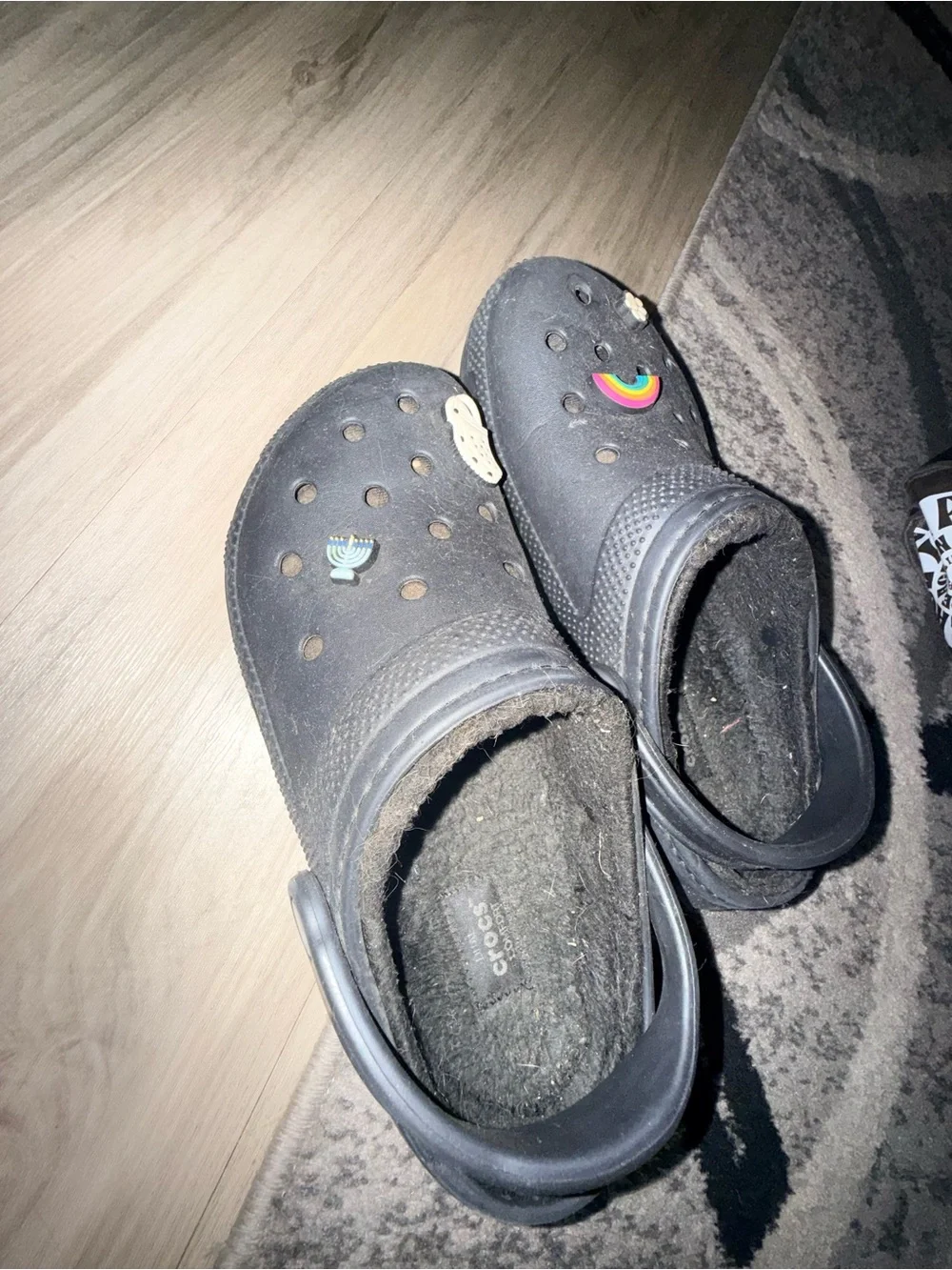 CROCS Kids Black Fuzzy-Lined Slip-Ons with Charms